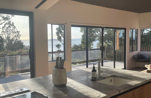 Titirangi House | Spacious hideaway with stunning harbour views