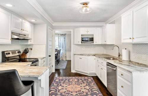 Merriam House | Spacious Home! Game Room, Swing Set, Deck, Yard, Outdoor Fun + Sleeps 16