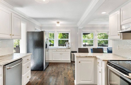 Merriam House | Spacious Home! Game Room, Swing Set, Deck, Yard, Outdoor Fun + Sleeps 16