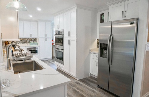 Deerfield Beach House | Spacious home with private salt water heated pool minutes to Beach !