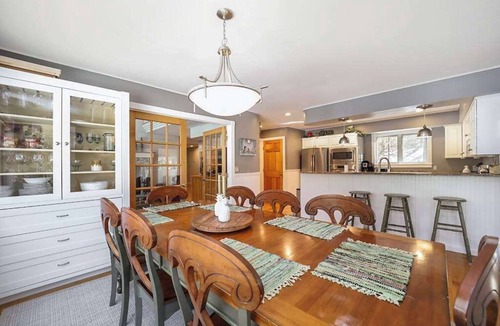 Maple City House | Spacious home with studio, lake access, sunroom, fireplace, W/D, & central AC