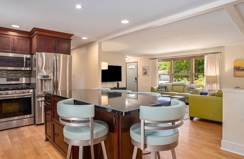 Macatawa House | Spacious house with private pool, badminton, cornhole, firepit, grill, and WiFi