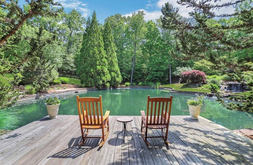 Flowery Branch House | Spacious Lake Front Home with beautiful Gardens, Pond, Waterfall, Pool, & Dock