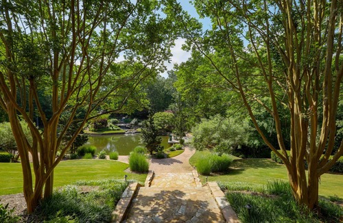 Flowery Branch House | Spacious Lake Front Home with beautiful Gardens, Pond, Waterfall, Pool, & Dock