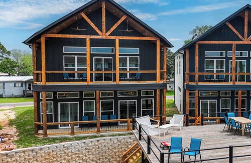 Cedar Creek Reservoir House | Spacious Lakefront Compound, 12BR, Boat Dock, Hot Tubs, Fire Pits, Sleeps 36