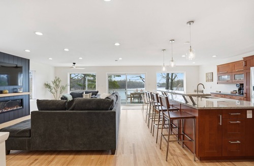 Lake Orion House | Spacious Lakefront Home w/Theater, Dock & Kayaks