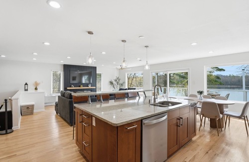 Lake Orion House | Spacious Lakefront Home w/Theater, Dock & Kayaks
