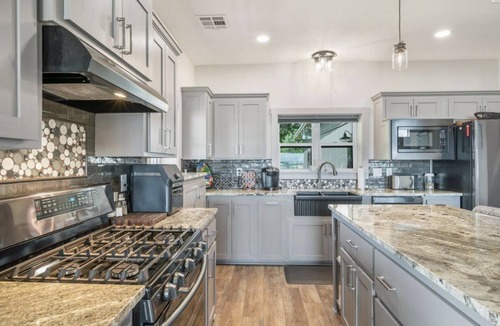 Wyandotte House | Spacious Lakefront Home w/hot tub, dock, & private ramp.