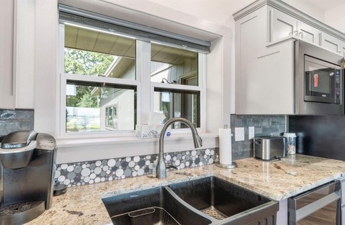 Wyandotte House | Spacious Lakefront Home w/hot tub, dock, & private ramp.