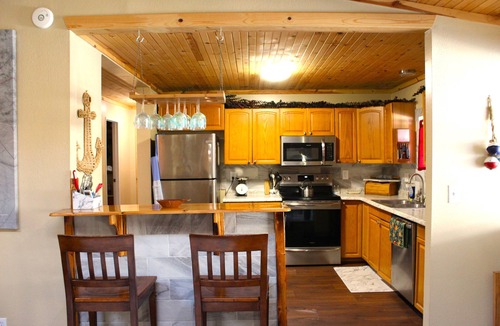 Willis House | Spacious Lakefront Retreat with Outdoor Entertaining Spaces, Office, + Parking