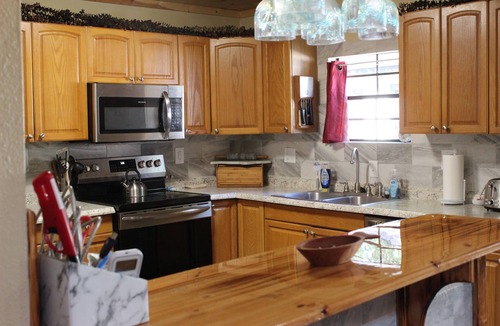 Willis House | Spacious Lakefront Retreat with Outdoor Entertaining Spaces, Office, + Parking