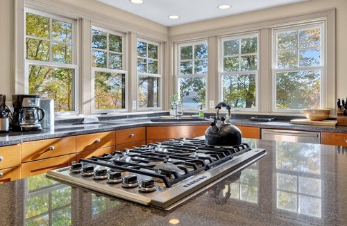Lansing House | Spacious Lakeside Retreat with Dock and Hot Tub!