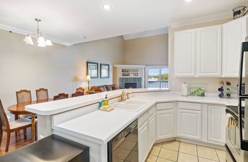 Sunrise Beach Condo | Spacious Lakeview Penthouse with Screened Balcony, Pool, Boat Slip & Lake Access