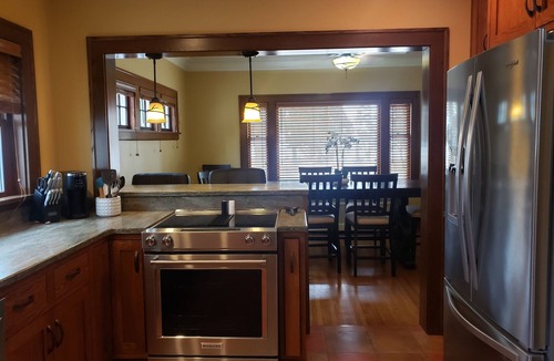 Storm Lake House | Spacious living captivating views overlooking the lake. With AC and Wi-Fi.