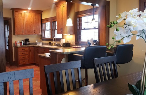 Storm Lake House | Spacious living captivating views overlooking the lake. With AC and Wi-Fi.