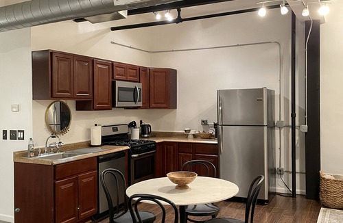 Utica Apartment | Spacious Loft in Historic Baggs Square