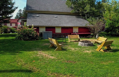 Saint Patrick Cottage | Spacious Loft Suite in Historic Carriage House w/Private Deck