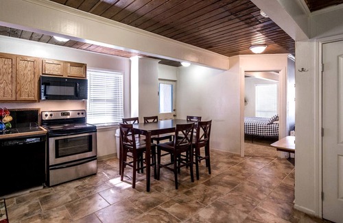 Woden House | Spacious Log Cabin Rental for Family Vacations in Texas
