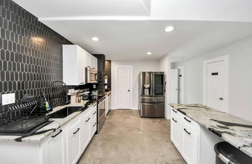 Midtown House | Spacious Midtown Home with Yard + Gym + Office + Balcony deck + Ping Pong