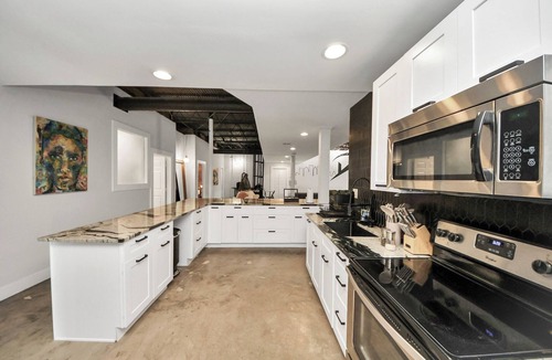 Midtown House | Spacious Midtown Home with Yard + Gym + Office + Balcony deck + Ping Pong