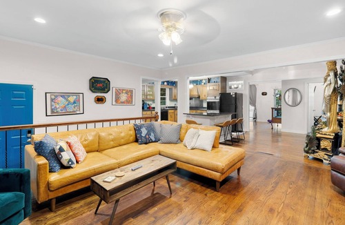 Terry Sanford House | Spacious open floor plan. 5 beds. 5 TVs. & Art.