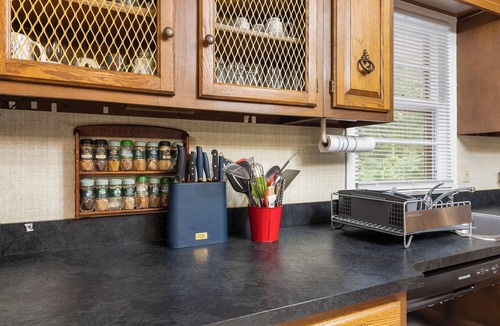 Terry Sanford House | Spacious open floor plan. 5 beds. 5 TVs. & Art.