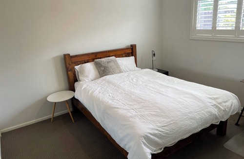 Truganina House | Spacious Queen Bedroom in Tranquil Oasis