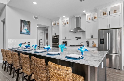 Green Cove Springs House | Spacious riverfront home perfect for larger families, featuring stunning river views, private dock
