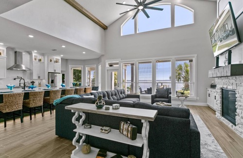 Green Cove Springs House | Spacious riverfront home perfect for larger families, featuring stunning river views, private dock