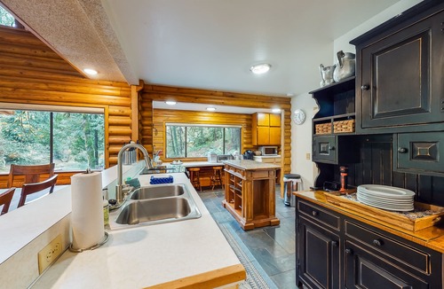 Washougal Cabin | Spacious riverfront lodge with beach access, private hot tub & forest views