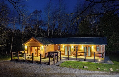 Whitebridge Ski Chalet | Spacious riverside lodge with mountain views.