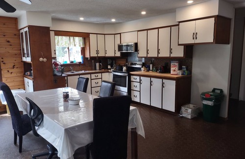 Haliburton House | Spacious Riverside Retreat - Located in Town - Book Now