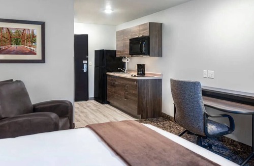 Rogers Hotel | Spacious Room w/Kitchen, Pet-Friendly & Free Parking for Extended & Short Stays