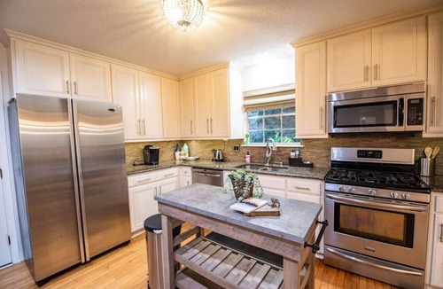 Little Rock House | Spacious, stylish home with fenced yard!