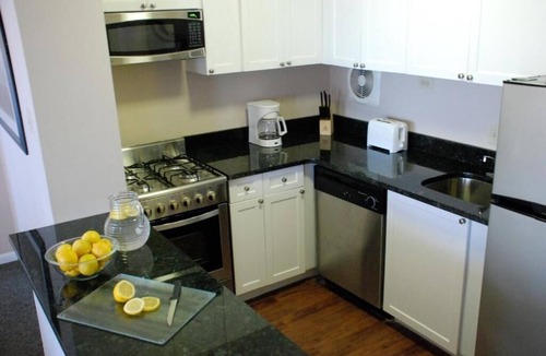 Logan Square Hotel | Spacious Suite with Kitchen | City Views | Rooftop Pool | Pet-Friendly