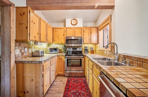 Tahoe City Condo | Spacious Townhome in the Trees Rocky Ridge Unit #75