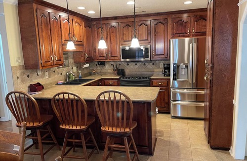 Decatur House | Spacious Townhome with Four Seasons Room