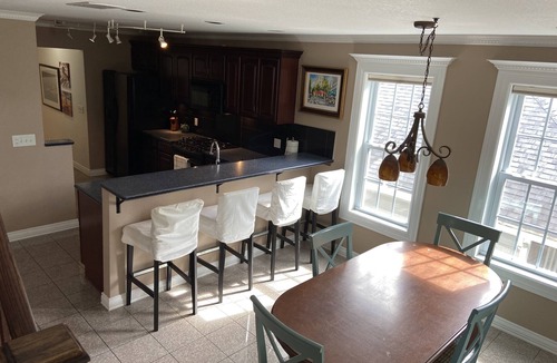 Bellaire Condo | Spacious Townhouse Retreat, Steps from everything. Bring the boat! Easy parking.