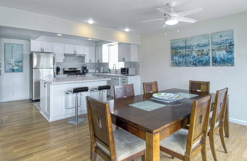 West Newport Apartment | Spacious Upper unit located just two houses from the sand!