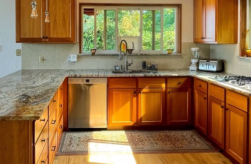 Kingston House | Spacious waterfront retreat with inviting deck, fireplace & games