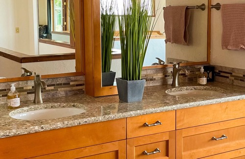 Kingston House | Spacious waterfront retreat with inviting deck, fireplace & games