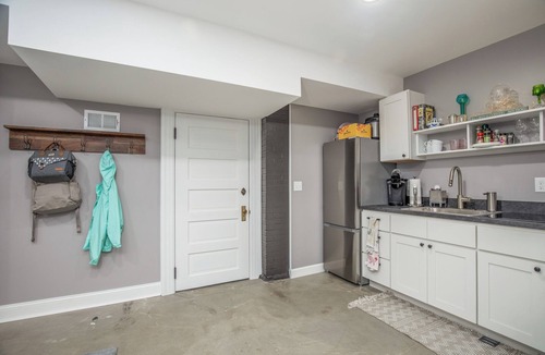 Central West End House | Spacious, well-equipped apartment with quality furnishings for a relaxing stay.