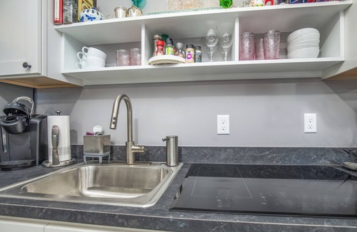 Central West End House | Spacious, well-equipped apartment with quality furnishings for a relaxing stay.