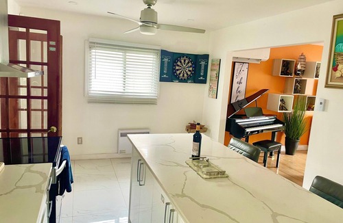 Sainte-Dorothee Apartment | Spacious Zen Floor in Laval - Private Heated & Salt Pool, Garden & Piano