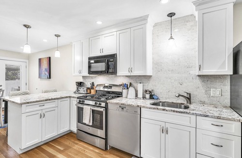 Allston House | Sparkling Boston Townhome with AC, Parking, Roku TV, Patio, Pet Friendly!