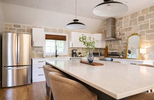 Southwest Raleigh House | Speakeasy Family Retreat with Skyline Views