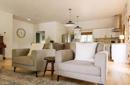 Southwest Raleigh House | Speakeasy Family Retreat with Skyline Views