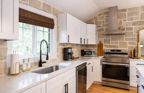 Southwest Raleigh House | Speakeasy Family Retreat with Skyline Views
