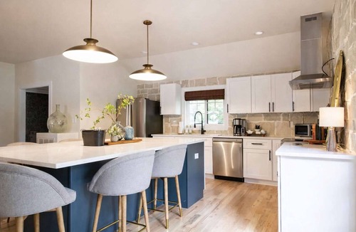 Southwest Raleigh House | Speakeasy Family Retreat with Skyline Views