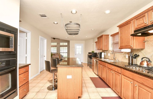 Manvel House | Spectacular Home with Private Pool, Theater&Grill!